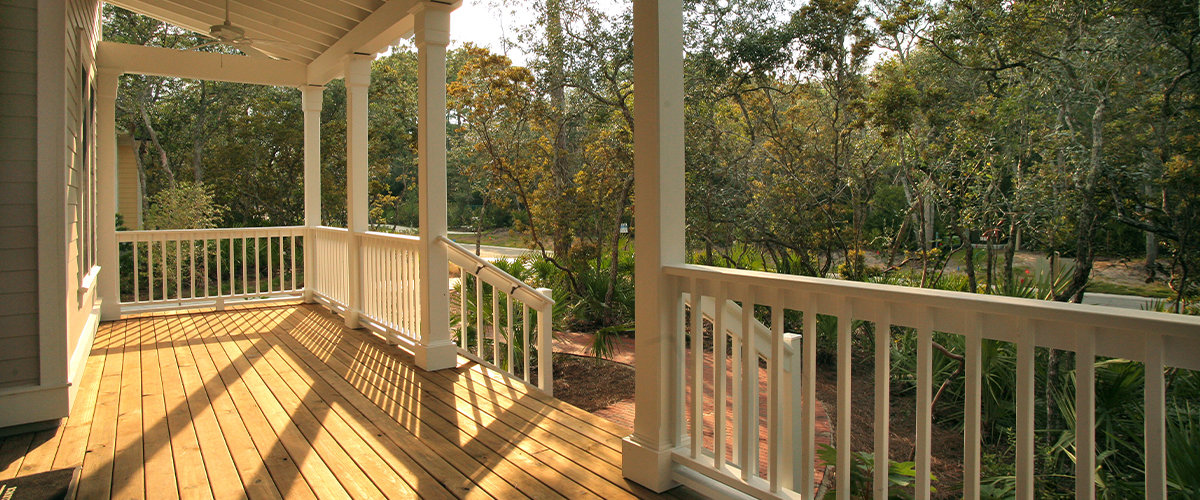 Wood deck with vinyl railing